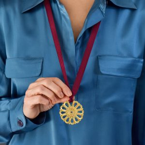Alternative view of Christmas decoration with gold plated blossom rosette design