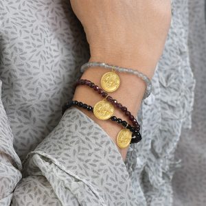 Alternative view of Bracelet with faceted onyx beads and 18k gold Pegasus motif
