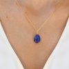 Εgg shaped lapis lazuli pendant with elegant twisted bail in 18k gold - Image 2