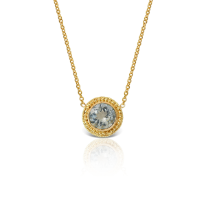 Necklace with round faceted aquamarine in 18k gold